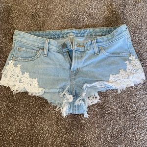 Light blue lace crop booty shorts